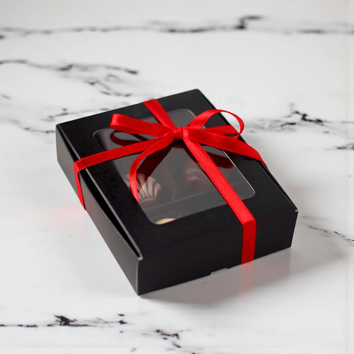 Caja souvenir negra de 6 bombones